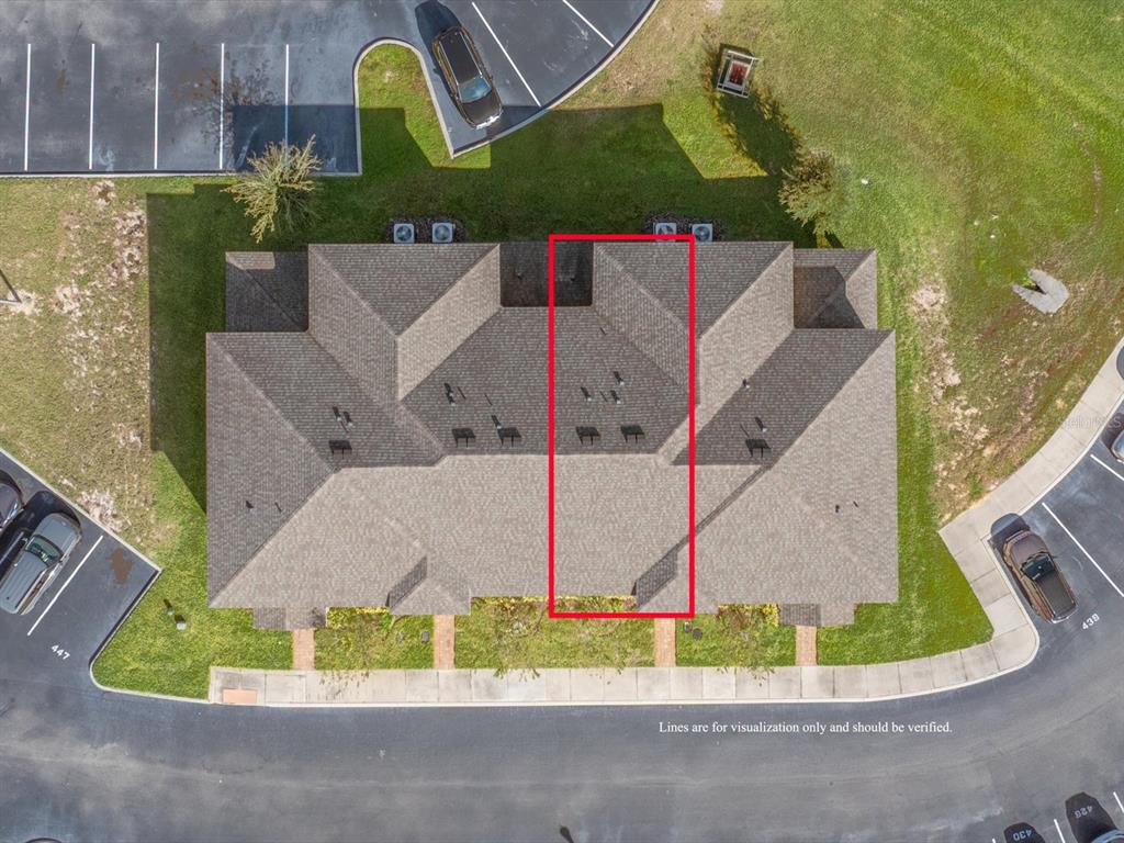 439 Annabelle Way Davenport, FL 33837 - Photo 27 of 31 an aerial view of a house with a garden and plants