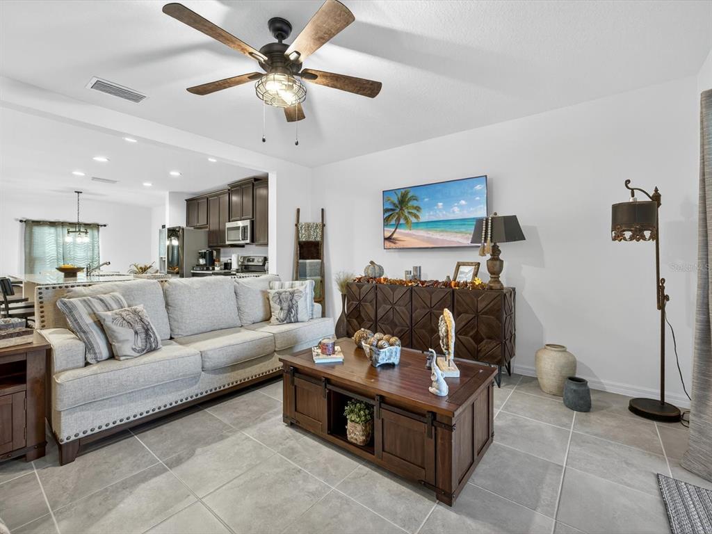 439 Annabelle Way Davenport, FL 33837 - Photo 6 of 31 a living room with furniture