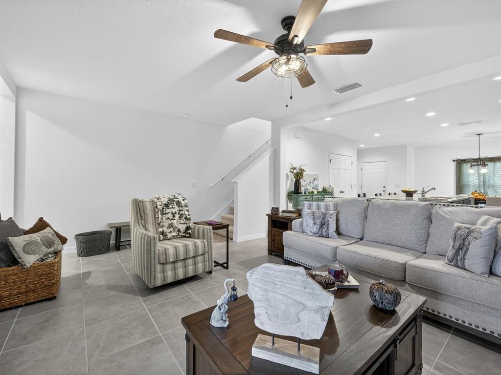 439 Annabelle Way Davenport, FL 33837 - Photo 7 of 31 a living room with furniture