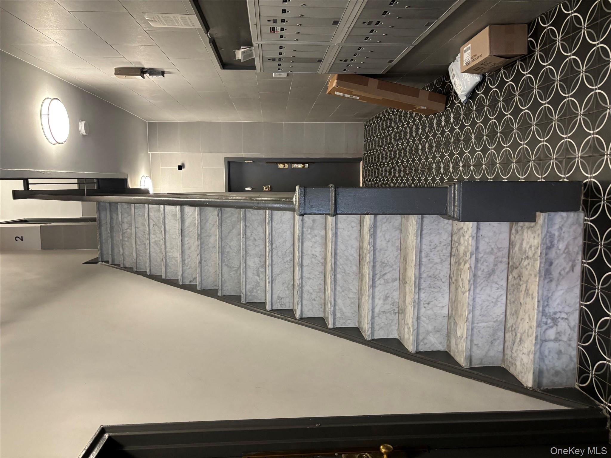 430 East 85th Street, Unit 6B Manhattan, NY 10028 - Photo 2 of 9 a bathroom with a sink and a mirror