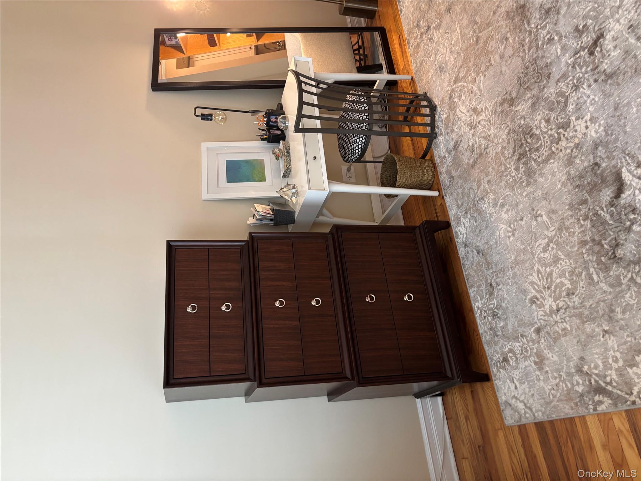 430 East 85th Street, Unit 6B Manhattan, NY 10028 - Photo 9 of 9 a room with a desk and a rug