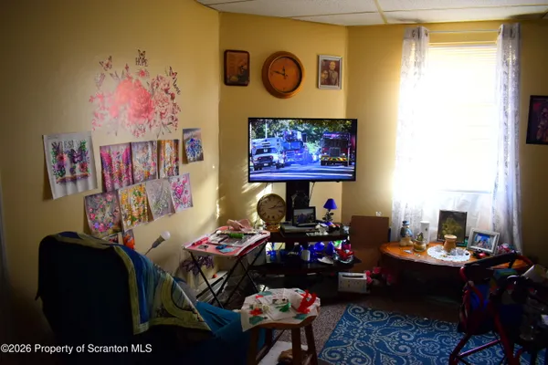 a room with furniture and a window