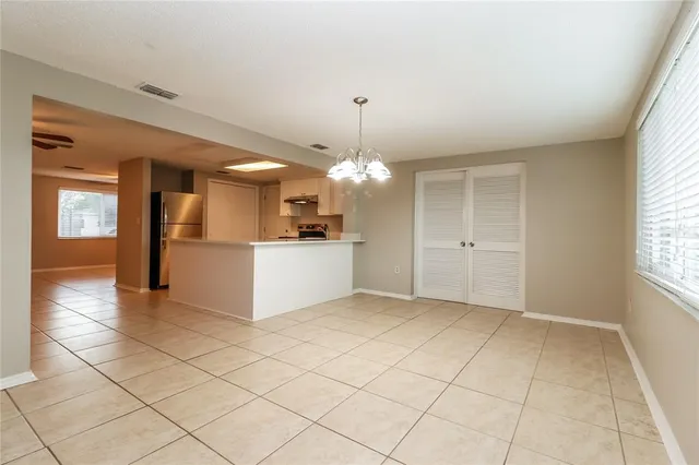 a view of a kitchen with a sink cabinets and window