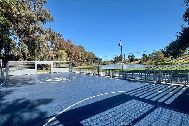 a view of a swimming pool with an outdoor space