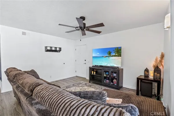 a bedroom with furniture and a fireplace