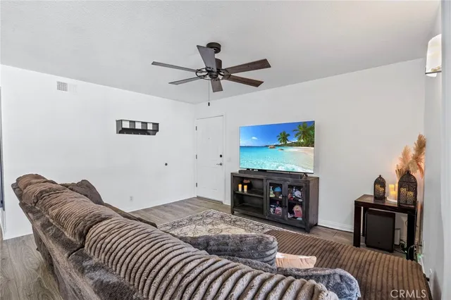 a bedroom with furniture and a fireplace