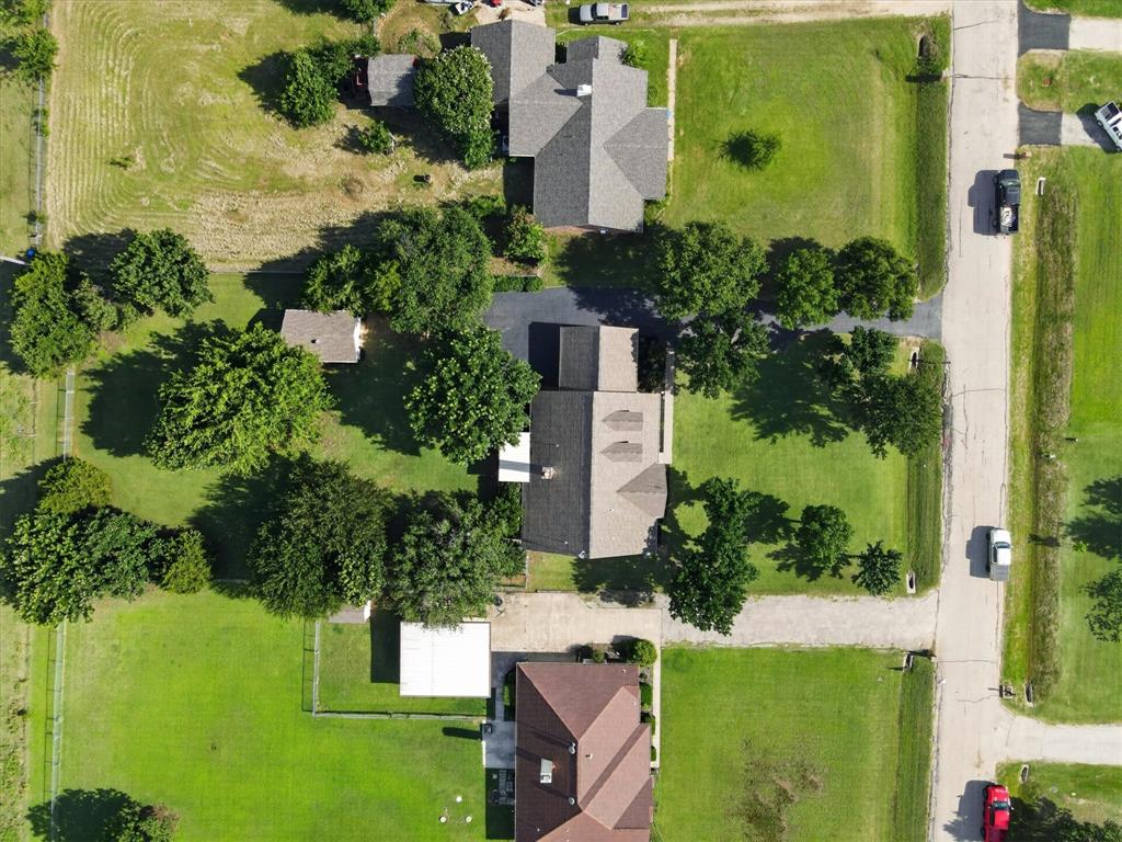421 Ben Boyd Road Argyle, TX 76226 - Photo 24 of 25 Aerial perspective showcasing multiple properties with extensive green lawns and mature trees
