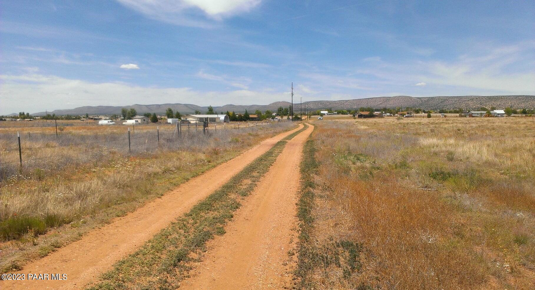 24755 North Stump Road Paulden, AZ 86334 - Photo 2 of 10 a view of a lake with a city view