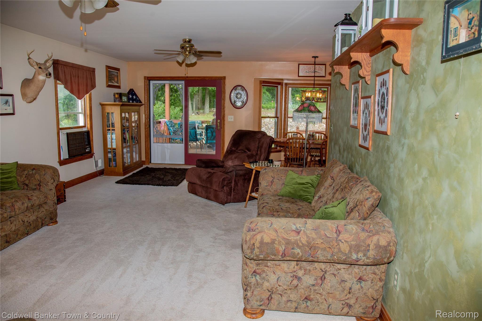 17090 Rosehill Road Pinckney, MI 48169 - Photo 12 of 47 Living Room, slider to back deck!