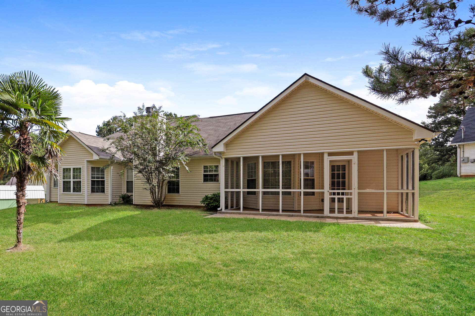 35 Spring Valley Keep Covington, GA 30016 - Photo 15 of 16 front view of a house with a yard