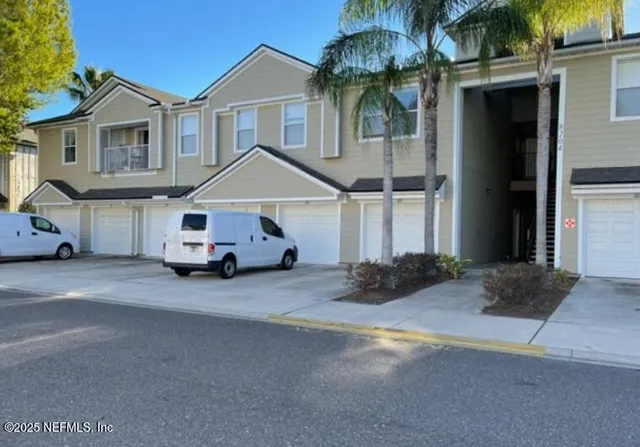 a car parked in front of a house