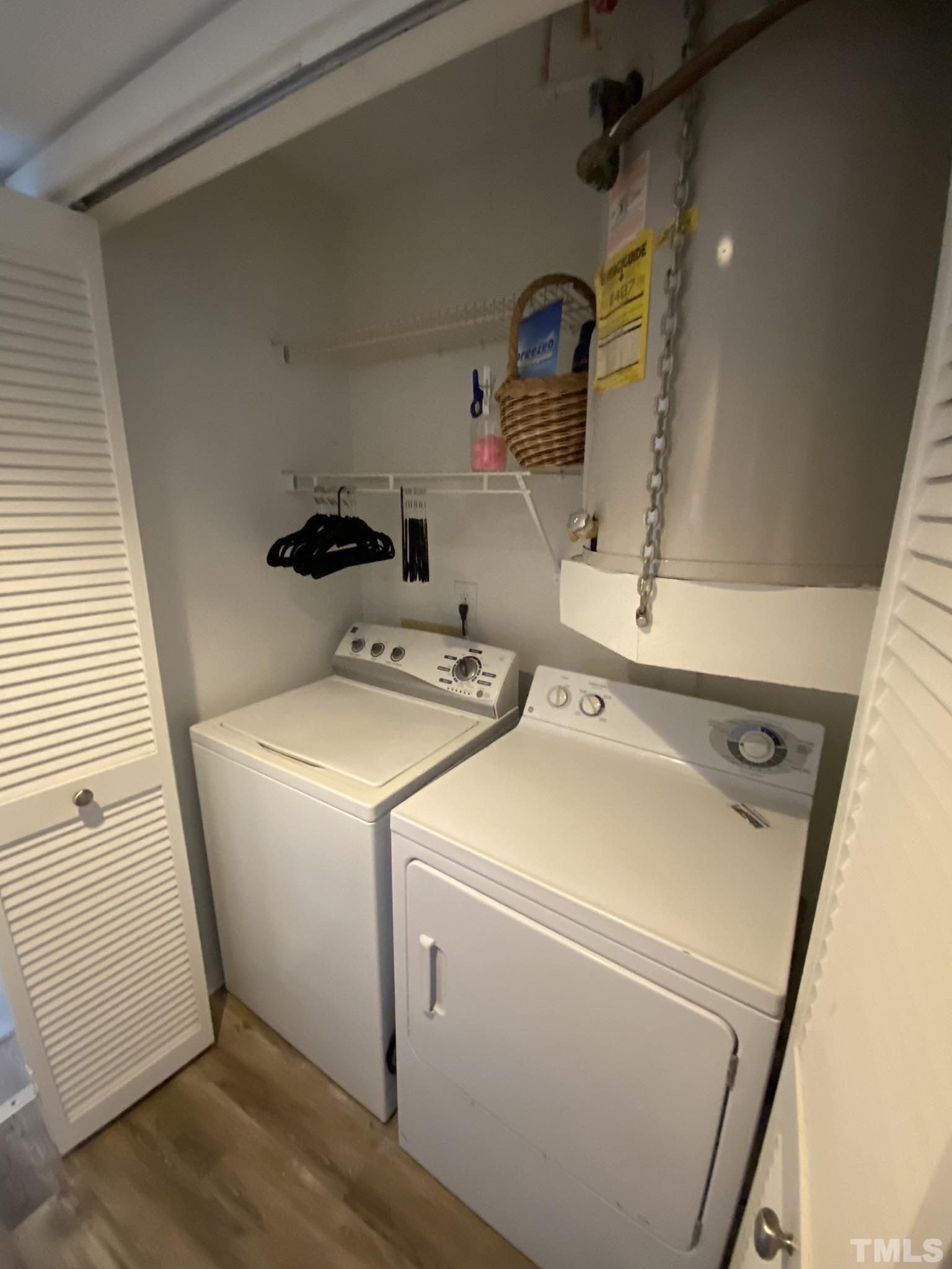 3700 Chimney Ridge Place, Unit 104 Durham, NC 27713 - Photo 11 of 17 a utility room with dryer and washer