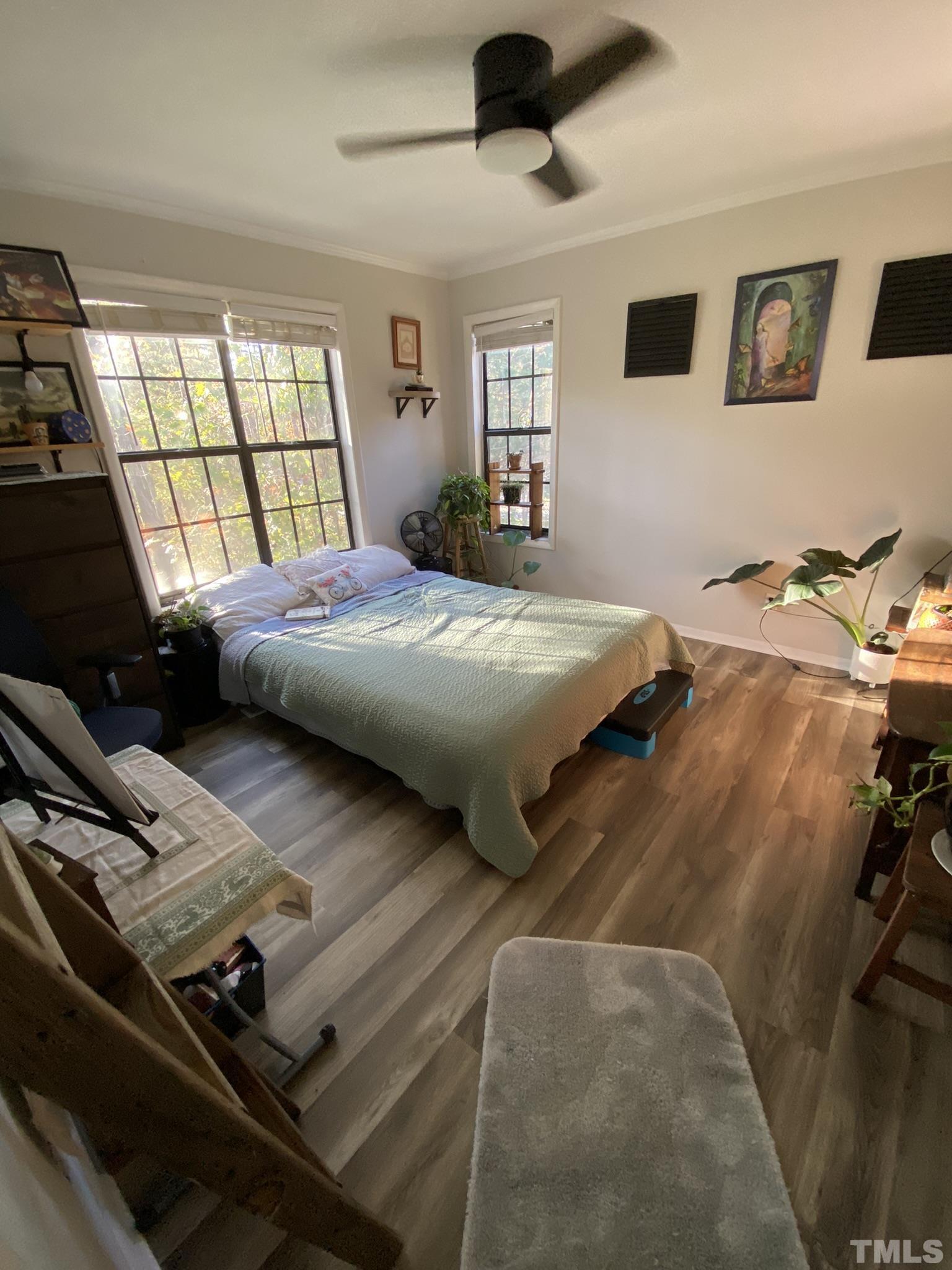 3700 Chimney Ridge Place, Unit 104 Durham, NC 27713 - Photo 13 of 17 a bedroom with a bed next to a window