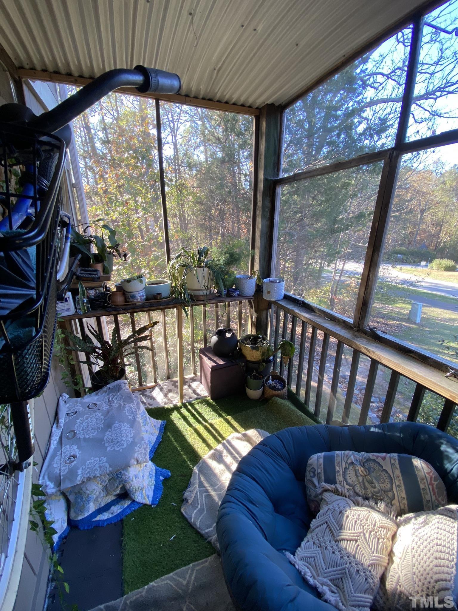 3700 Chimney Ridge Place, Unit 104 Durham, NC 27713 - Photo 15 of 17 a living room with furniture fireplace and a large window