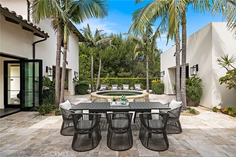 a view of an outdoor space with furniture