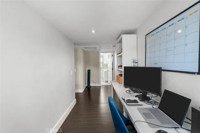 a view of a workspace with furniture