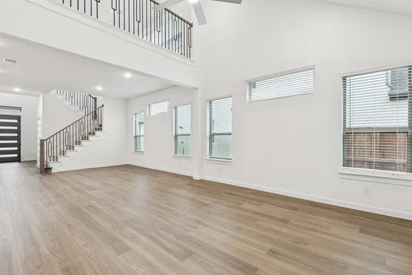 a view of an entryway with wooden floor