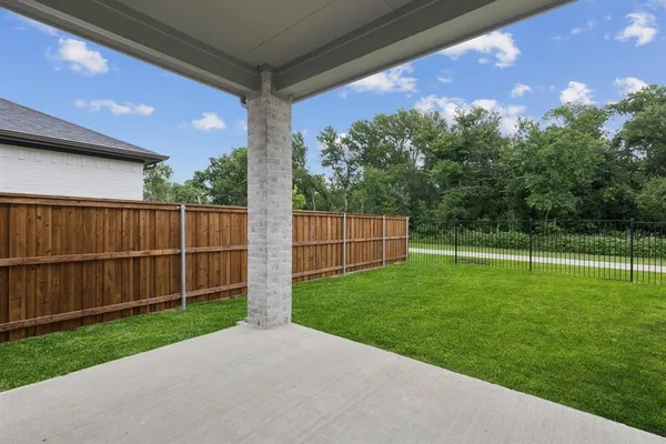 a view of a backyard with a garden