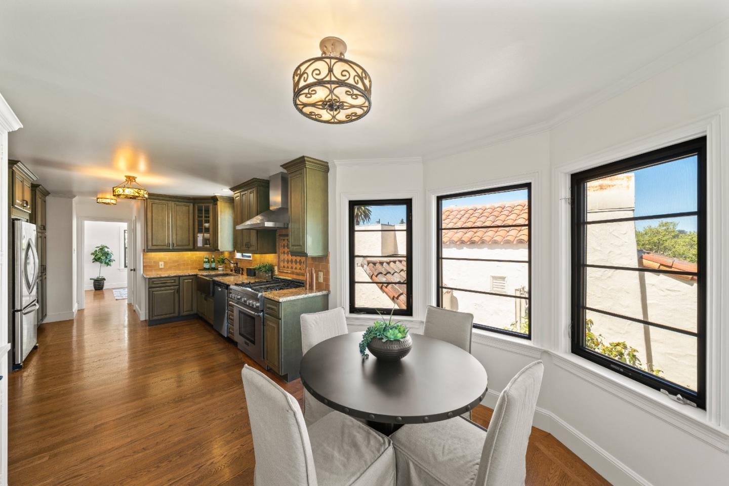 331 Elder Avenue Millbrae, CA 94030 - Photo 17 of 53 a living room with furniture and a large window