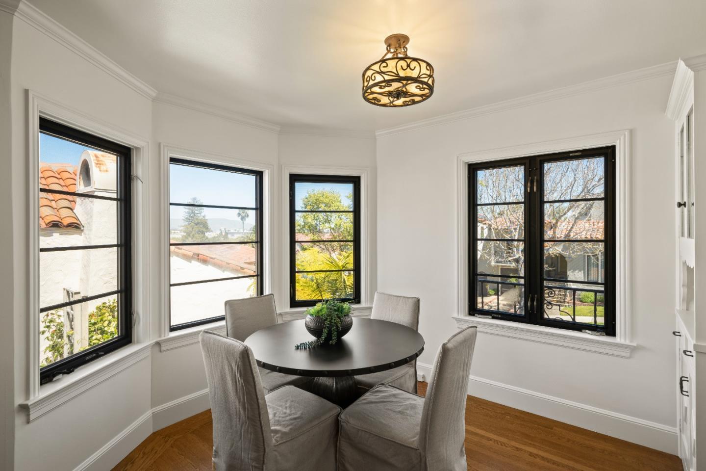 331 Elder Avenue Millbrae, CA 94030 - Photo 18 of 53 a view of a dining room with furniture and windows