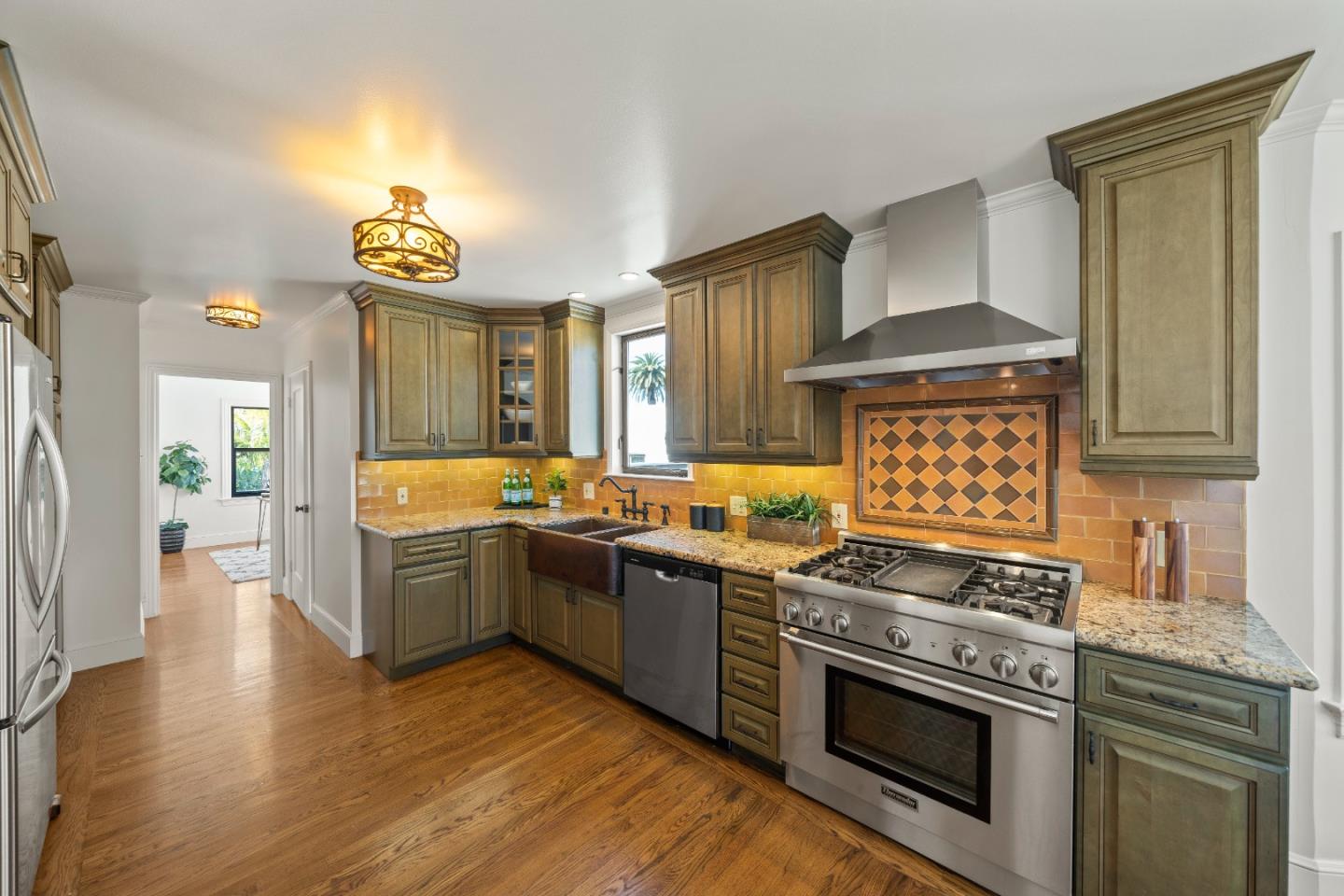 331 Elder Avenue Millbrae, CA 94030 - Photo 20 of 53 a kitchen with a stove and a sink