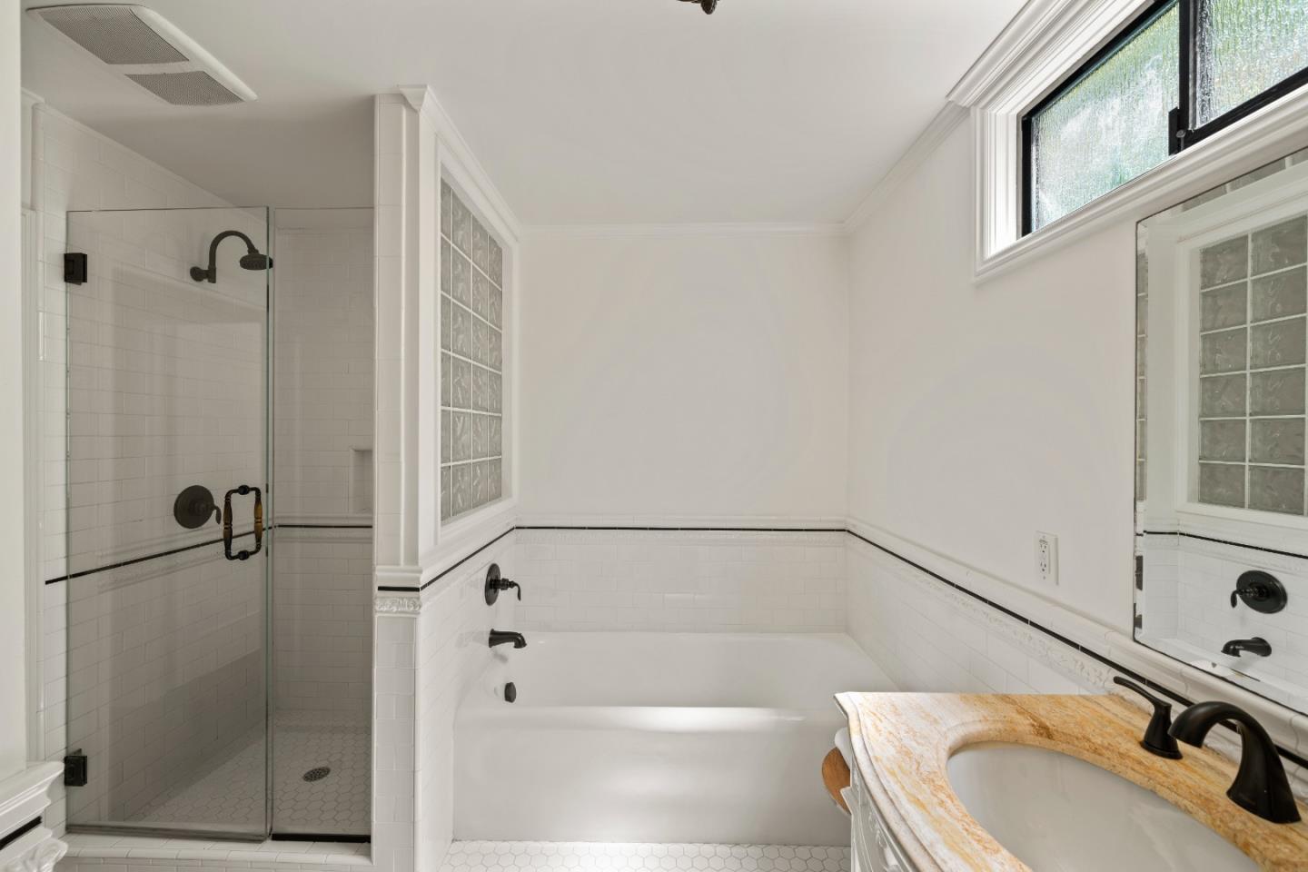 331 Elder Avenue Millbrae, CA 94030 - Photo 26 of 53 a bathroom with a sink and a shower