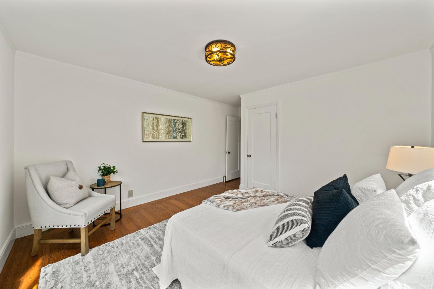 331 Elder Avenue Millbrae, CA 94030 - Photo 28 of 53 a bedroom with a bed and a chair