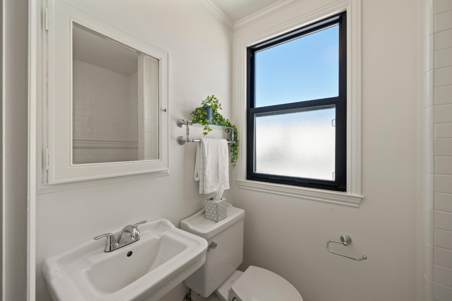 331 Elder Avenue Millbrae, CA 94030 - Photo 31 of 53 a bathroom with a toilet sink and mirror