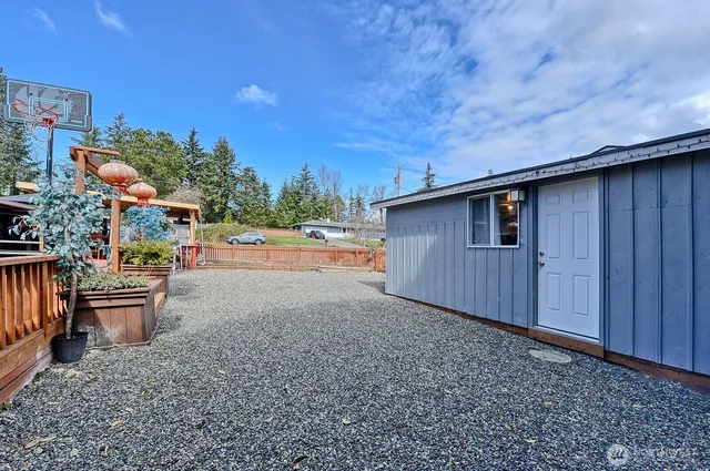 a backyard of a house with lots of green space