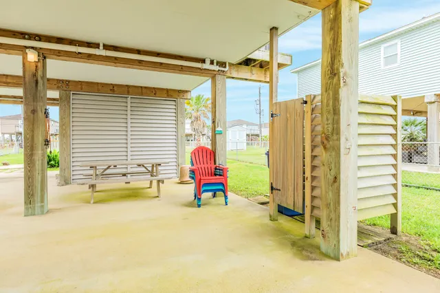 a bathroom with a tub and a shower