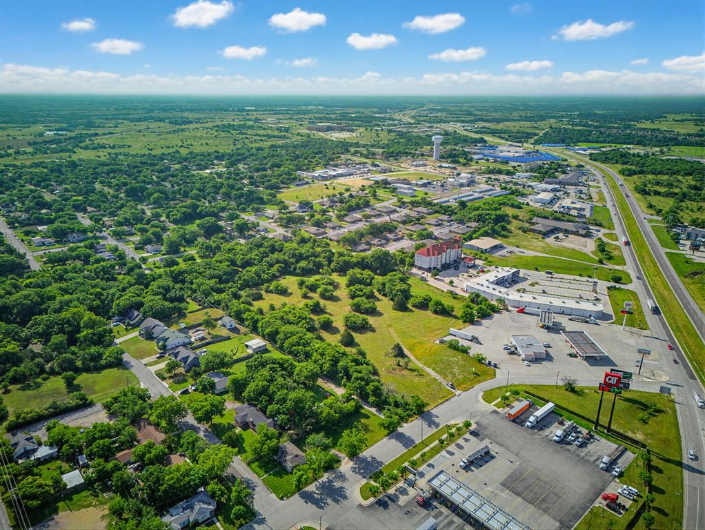 1300 South Trenchard Street Decatur, TX 76234 - Photo 10 of 40 an aerial view of residential houses with outdoor space