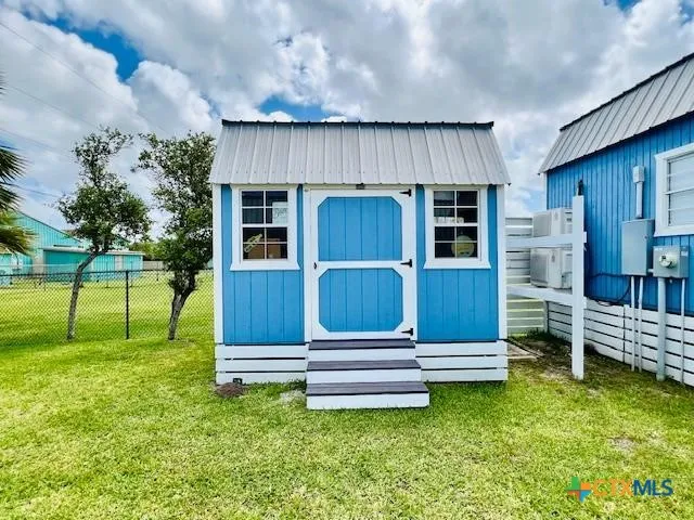 a house view with a garden space
