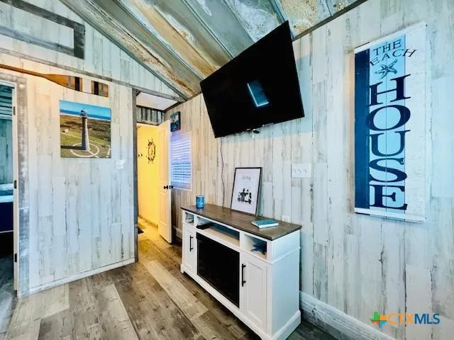 a hallway with washer and dryer