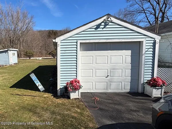 a front view of a house with a garage