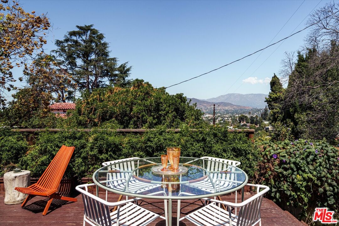 1410 Stanford Drive Glendale, CA 91205 - Photo 17 of 31 a view of balcony with outdoor seating and city view