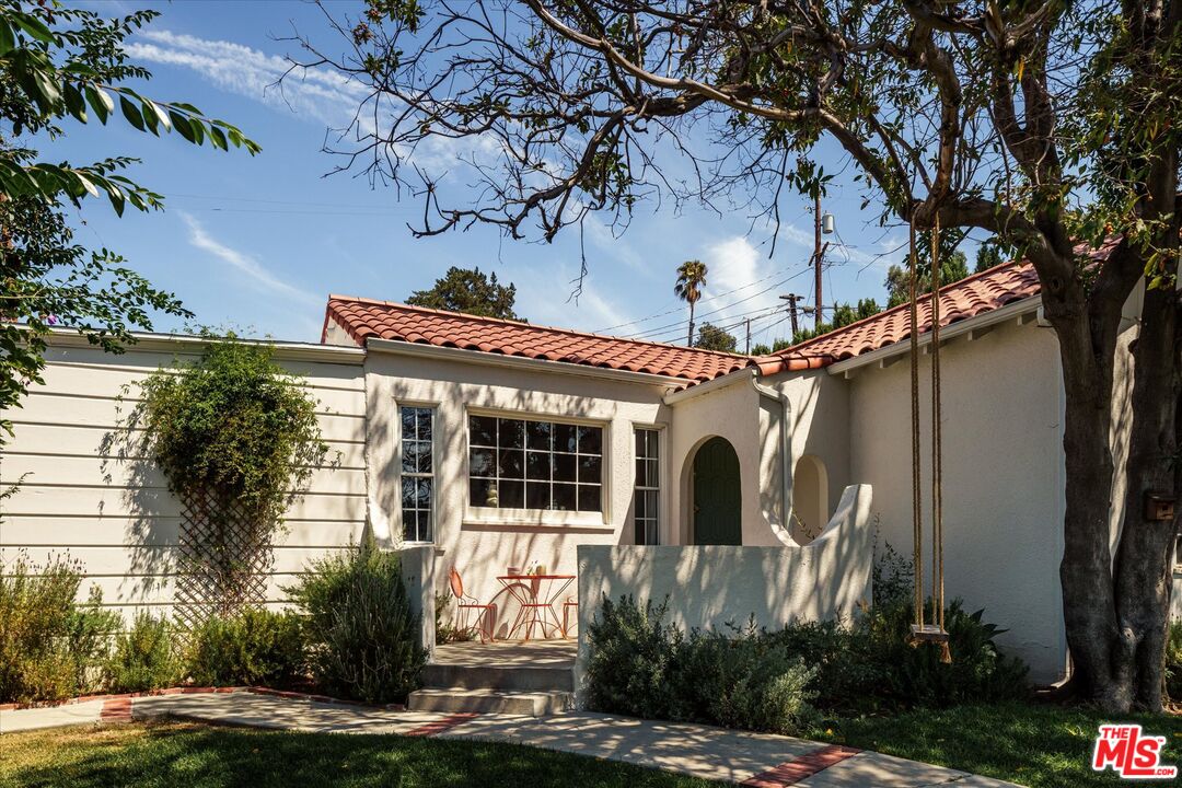 1410 Stanford Drive Glendale, CA 91205 - Photo 3 of 31 a front view of a house with garden