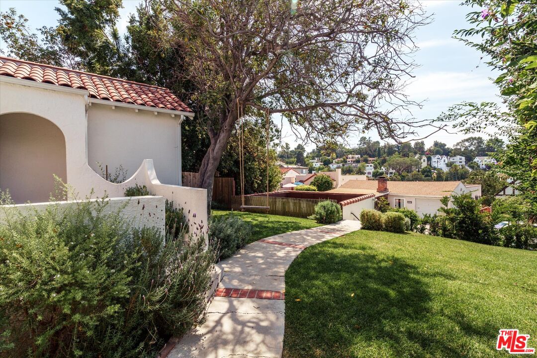 1410 Stanford Drive Glendale, CA 91205 - Photo 5 of 31 a front view of a house with garden