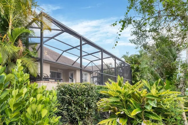 an aerial view of a house with a garden
