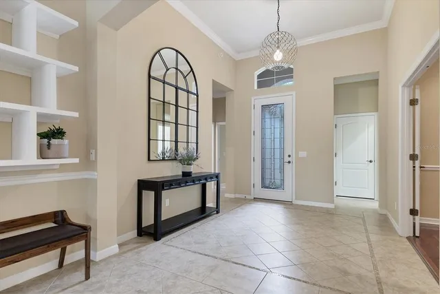 a view of a livingroom with furniture and windows