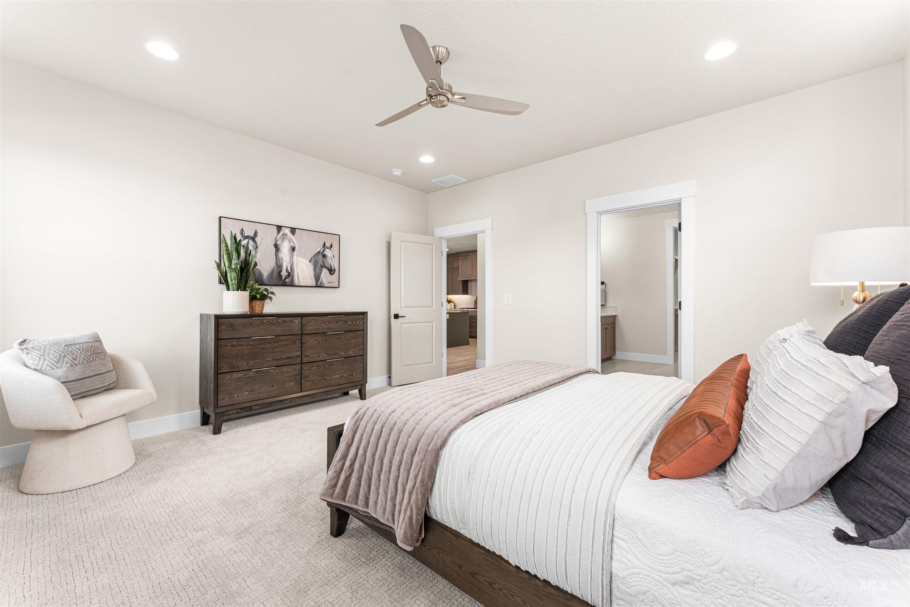 8082 Tandy Cv Street Middleton, ID 83644 - Photo 17 of 37 Bedroom featuring carpet, ceiling fan, ensuite bathroom, and recessed lighting
