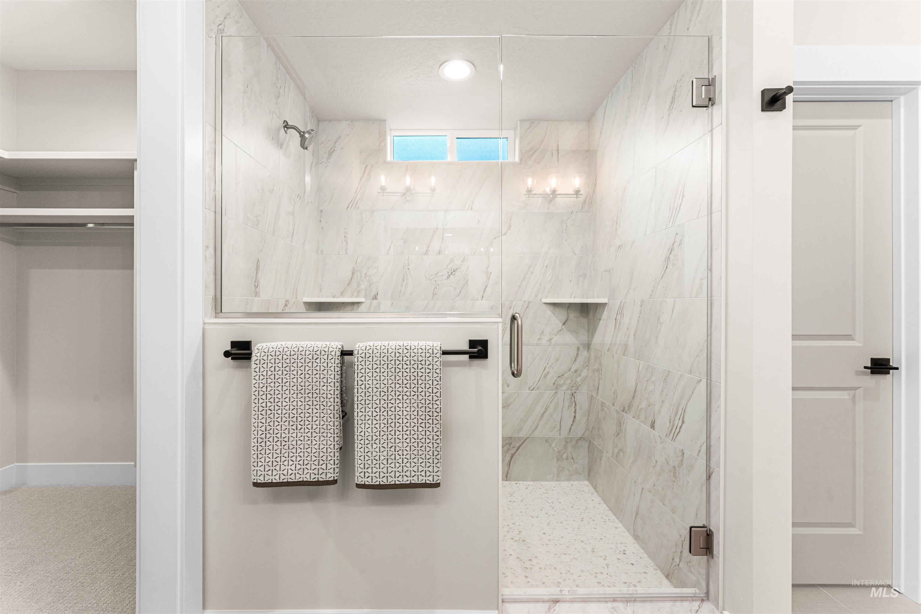 8082 Tandy Cv Street Middleton, ID 83644 - Photo 19 of 37 Full bathroom with a marble finish shower and recessed lighting