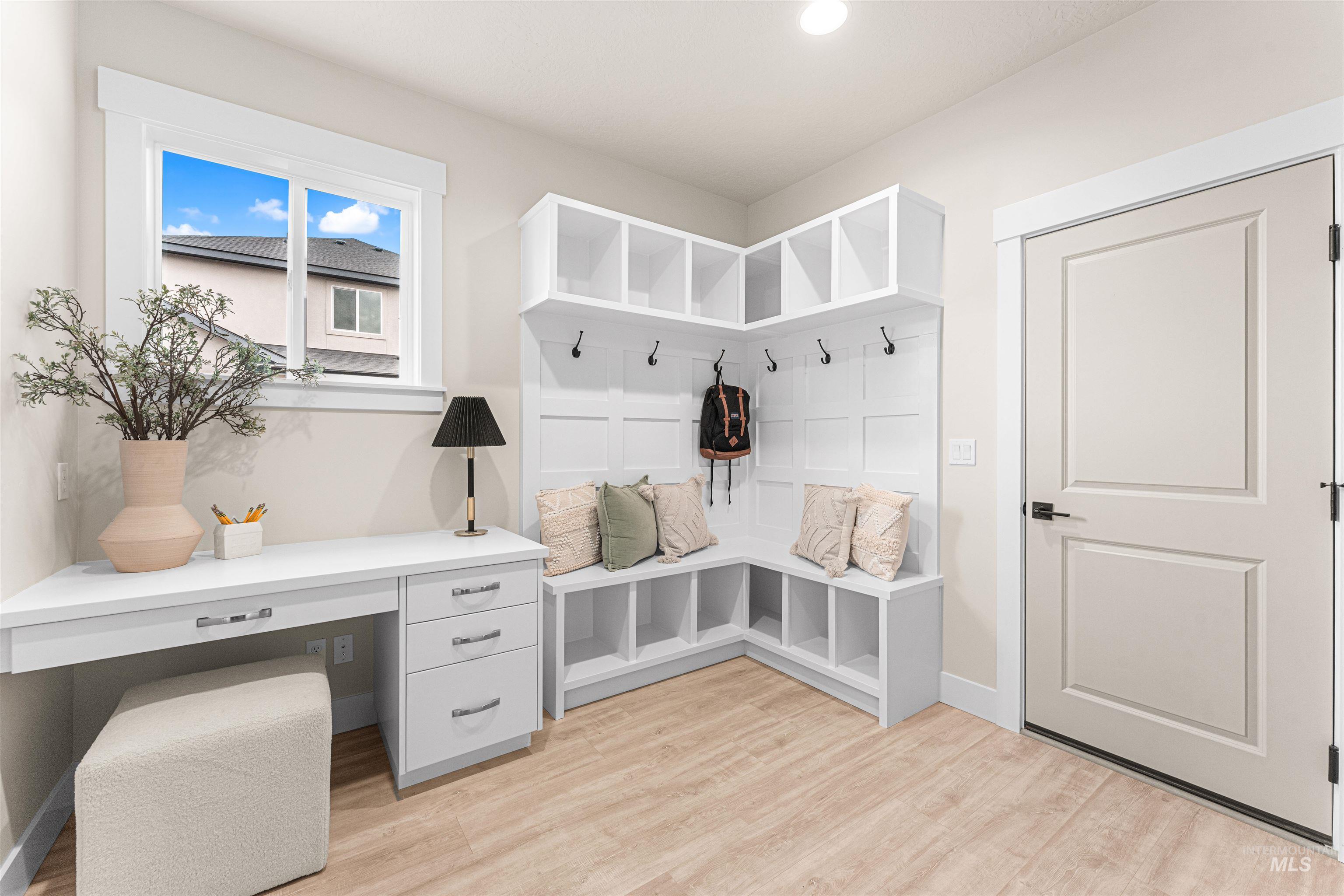 8082 Tandy Cv Street Middleton, ID 83644 - Photo 26 of 37 Mudroom featuring light wood-type flooring and built in study area