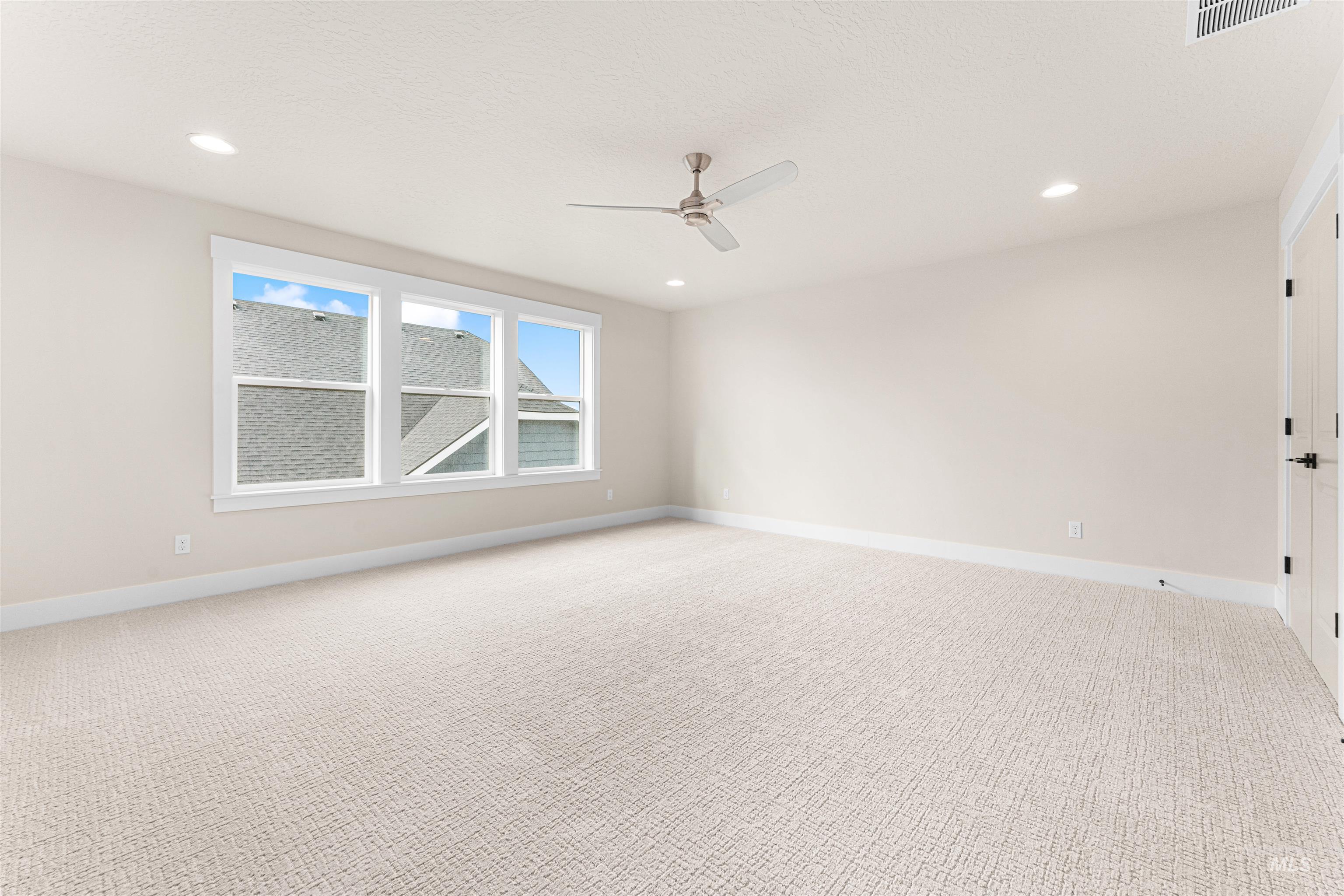 8082 Tandy Cv Street Middleton, ID 83644 - Photo 29 of 37 Spare room with carpet flooring, a ceiling fan, and recessed lighting