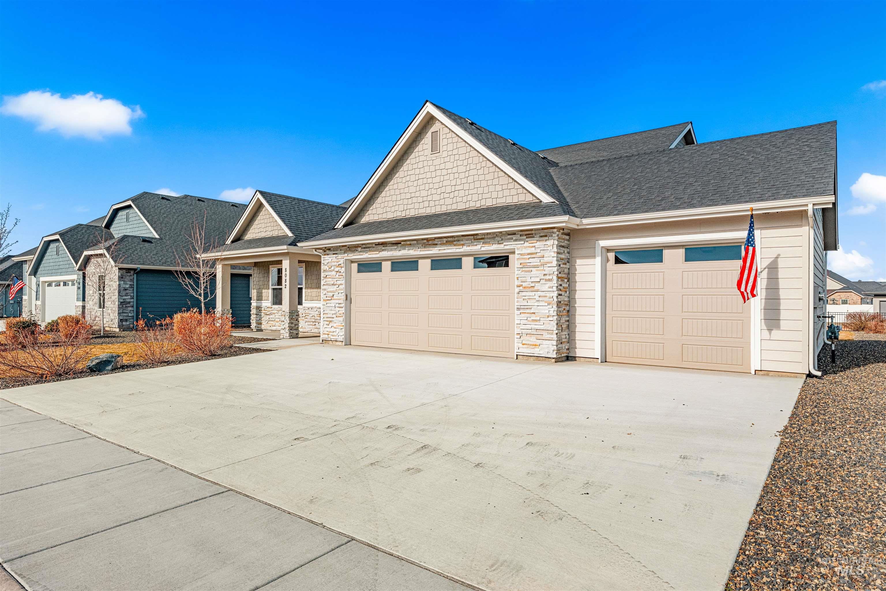 8082 Tandy Cv Street Middleton, ID 83644 - Photo 36 of 37 Craftsman inspired home with driveway, a garage, and a shingled roof