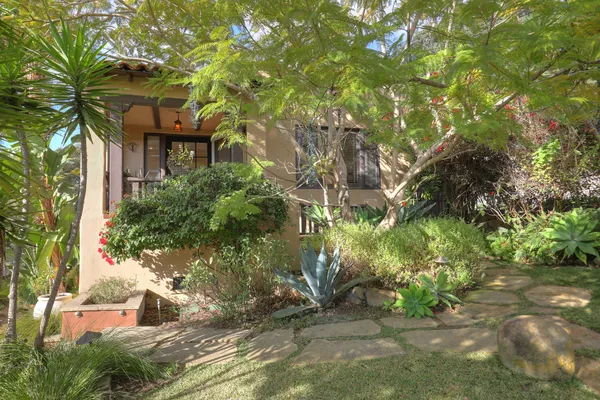 a backyard of a house with lots of green space