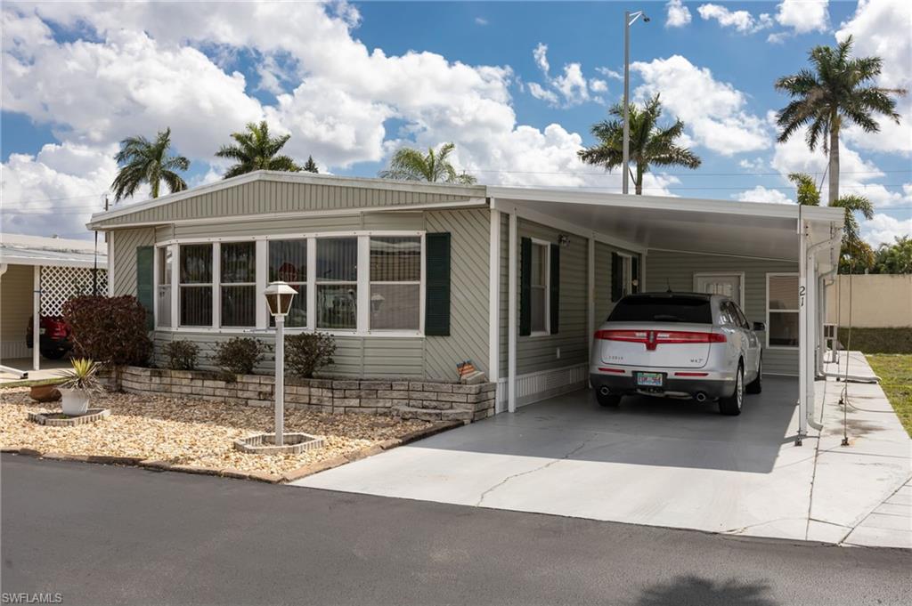 a car parked in front of a house