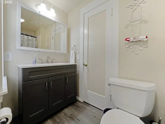 a kitchen with a sink stove and window
