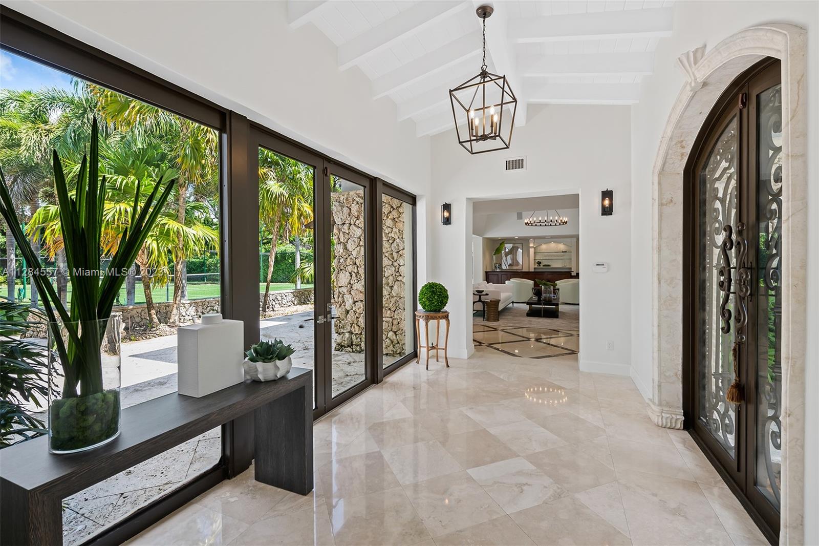 4845 Davis Road Miami, FL 33143 - Photo 7 of 34 a view of a livingroom with furniture and windows