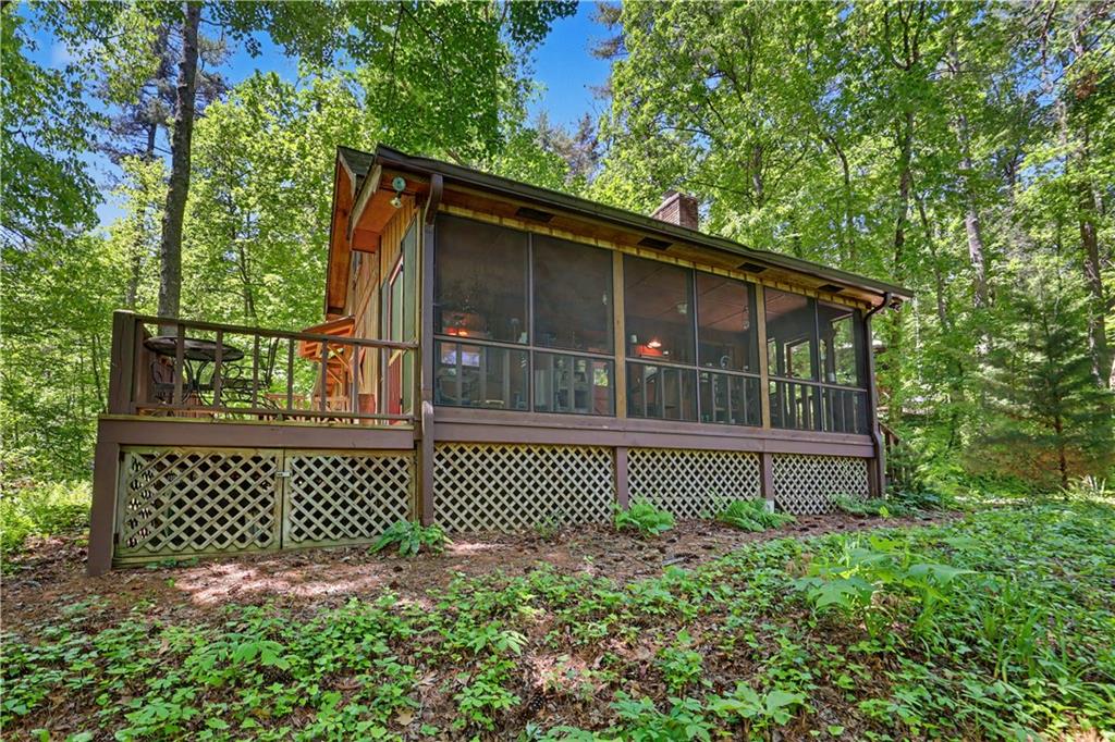 102 Moses Road Rabun Gap, GA 30568 - Photo 37 of 40 a house view with a garden space