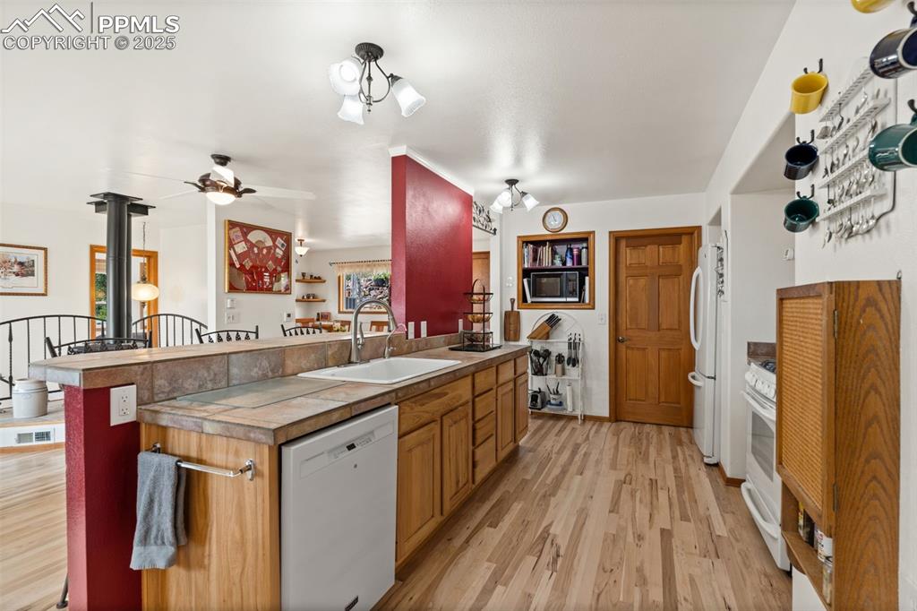 64 Highland Road Palmer Lake, CO 80133 - Photo 21 of 45 Deep Country Sink with Upgraded Faucet and Filtered Water Dispenser